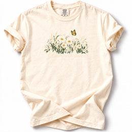 Bloom in Grace Premium T-Shirt in Ivory, front view with wildflowers and butterfly artwork