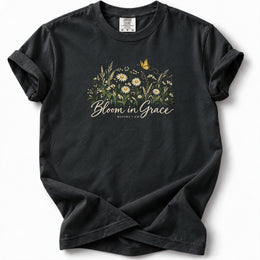 Bloom in Grace Premium T-Shirt in Black, front view with wildflowers and butterfly artwork