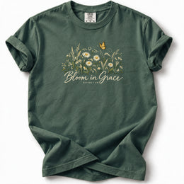 Bloom in Grace Premium T-Shirt in Blue Spruce, front view with wildflowers and butterfly artwork