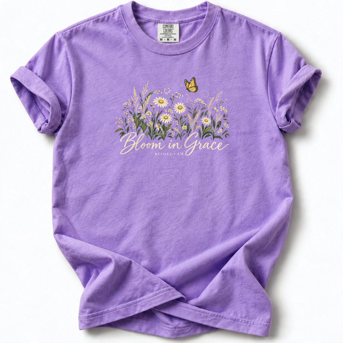 Bloom in Grace Premium T-Shirt in Violet, front view with wildflowers and butterfly artwork