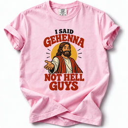 I Said Gehenna Premium T-Shirt in Blossom, front view with playful Jesus illustration