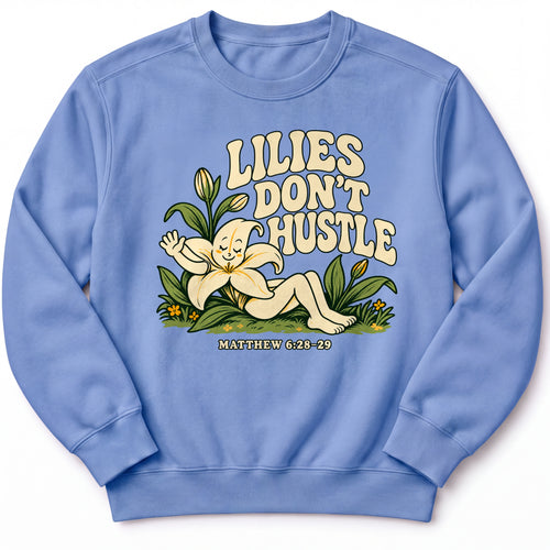 Lilies Don’t Hustle Premium Sweatshirt in Flo Blue, front view with botanical character inspired by Matthew 6:28–29