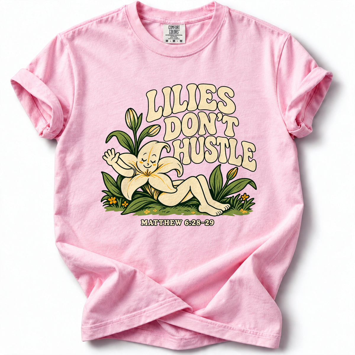 Lilies Don’t Hustle Premium T-Shirt in Blossom, front view with botanical character inspired by Matthew 6:28–29