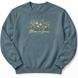 Bloom in Grace Premium Sweatshirt in Blue Spruce, front view with wildflowers and butterfly artwork
