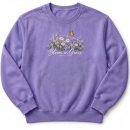 Bloom in Grace Premium Sweatshirt in Violet, front view with wildflowers and butterfly artwork
