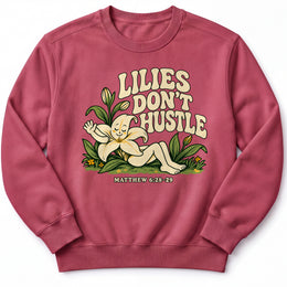 Lilies Don’t Hustle Premium Sweatshirt in Crimson, front view with botanical character inspired by Matthew 6:28–29