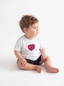 Pure of Heart Baby T-Shirt in White, Liam right three quarter view