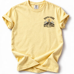 Your Light Has Come Edition T-Shirt in Butter – left chest Isaiah 60:1 design